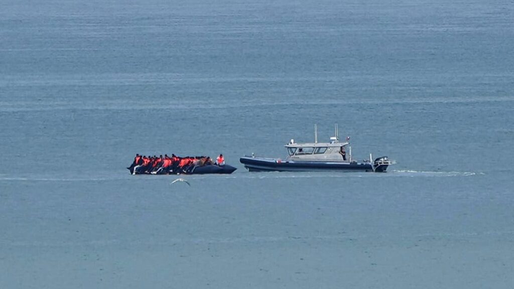Record 230 migrants cross English Channel in single small boat