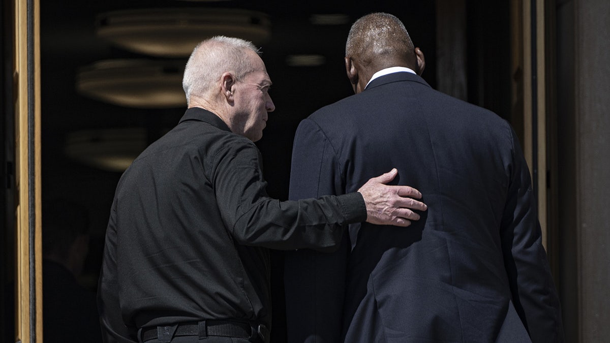 U.S. Secretary of Defense Lloyd Austin (R) welcomes Israeli Defense Minister Yoav Gallant