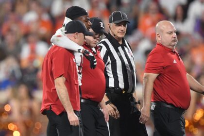 Louisville football player stretchered off, hospitalized after suffering injury in game