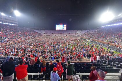 Ole Miss fans storm field with time remaining on clock, prompting delay to game’s end