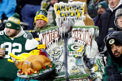 Video of bundled-up Dolphins players warming up at Lambeau Field goes viral after Thanksgiving Day loss