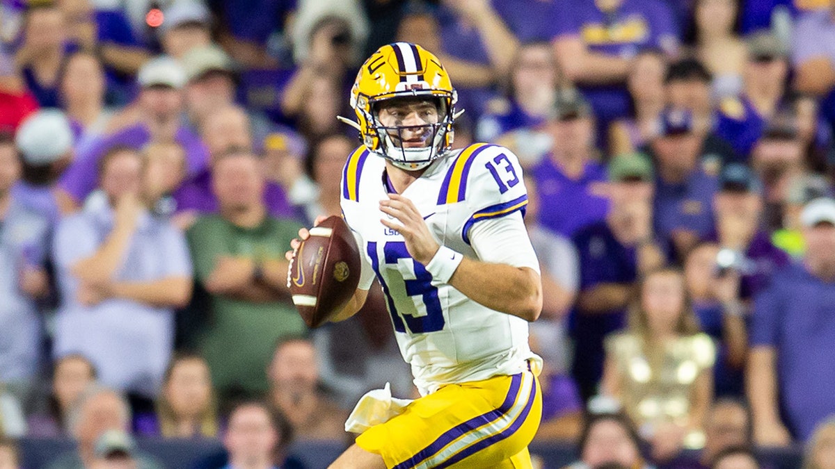 Garrett Nussmeier looks to pass