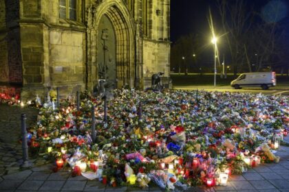 Candles and flowers flood makeshift memorial for Magdeburg attack