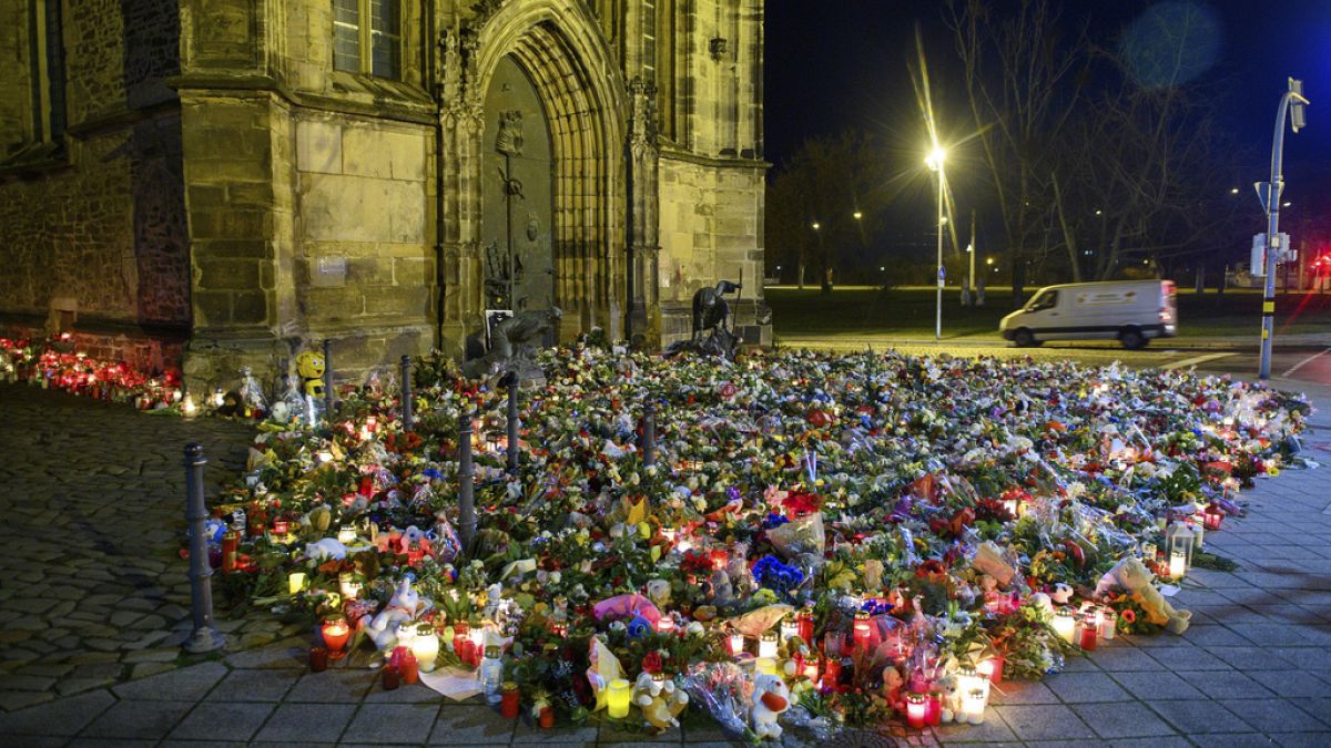 Candles and flowers flood makeshift memorial for Magdeburg attack