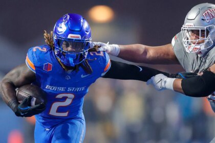 Heisman hopeful Ashton Jeanty points to his faith after playoff-bound Boise State wins Mountain West title