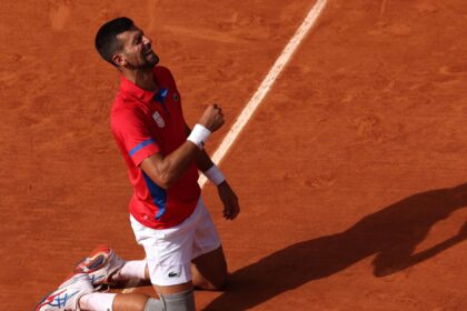 Watch emotional moment as ecstatic Novak Djokovic collapses to ground after beating Carlos Alcaraz for Olympic gold – Tennis video