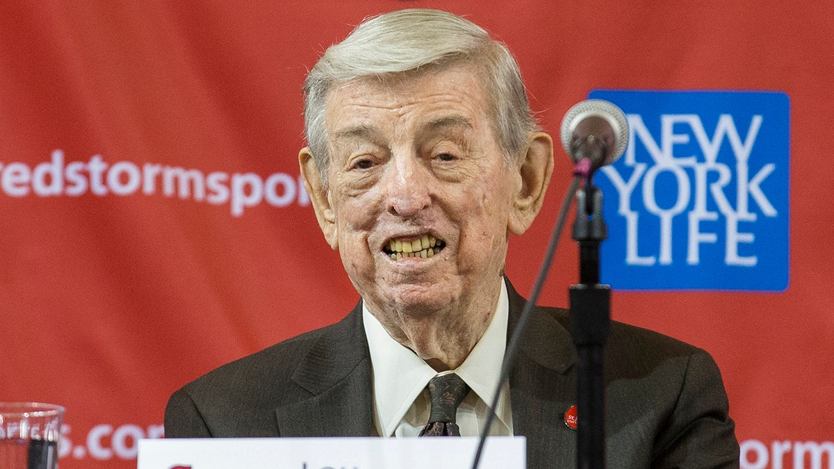 Lou Carnesecca smiles