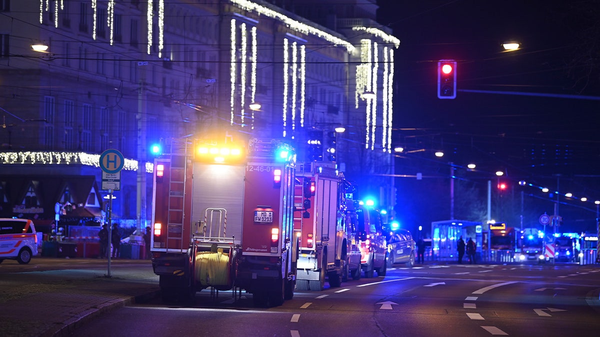 Emergency services attend an incident at the Christmas market in Magdeburg, Germany, Friday Dec. 20, 2024. (Heiko Rebsch/dpa via AP)