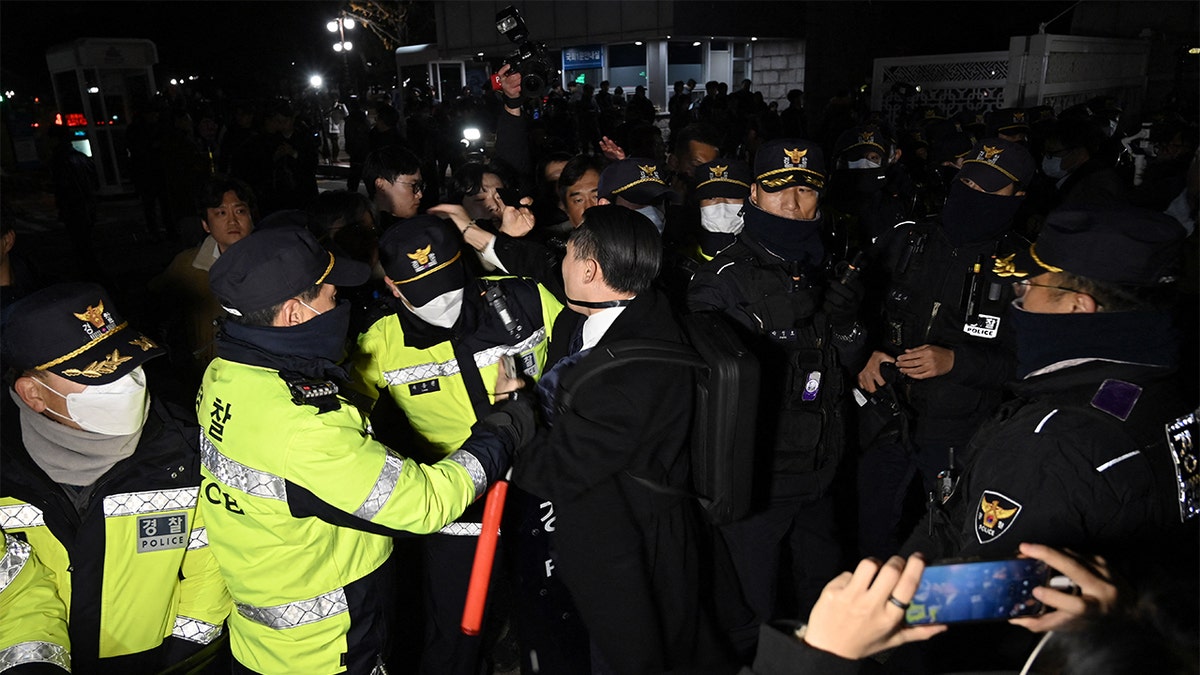 South Korean people clash with police outside National Assembly