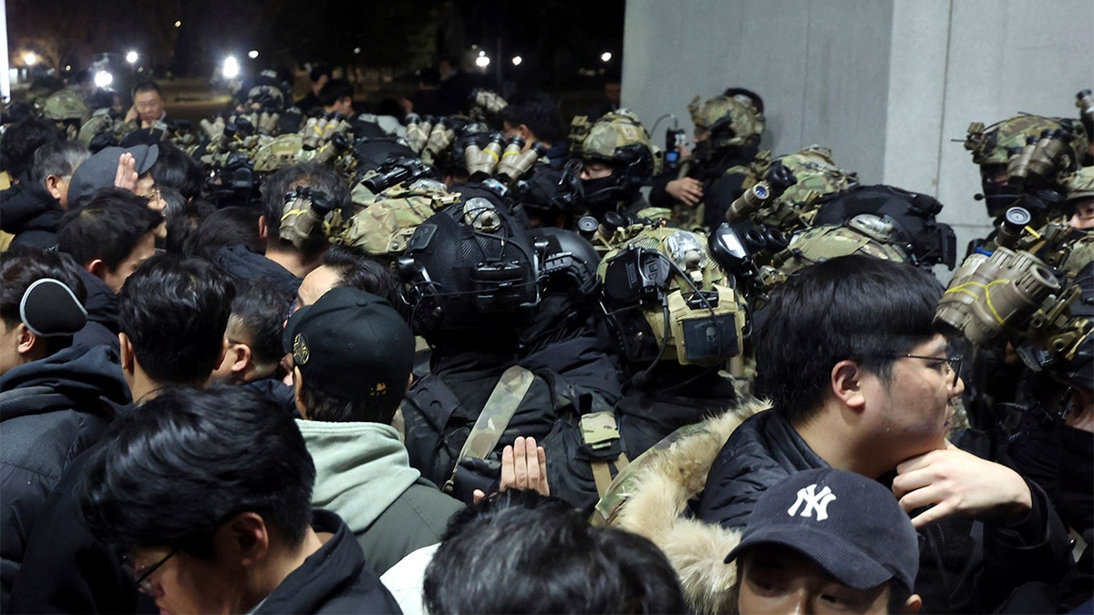 South Korean soldiers attempt to enforce martial law