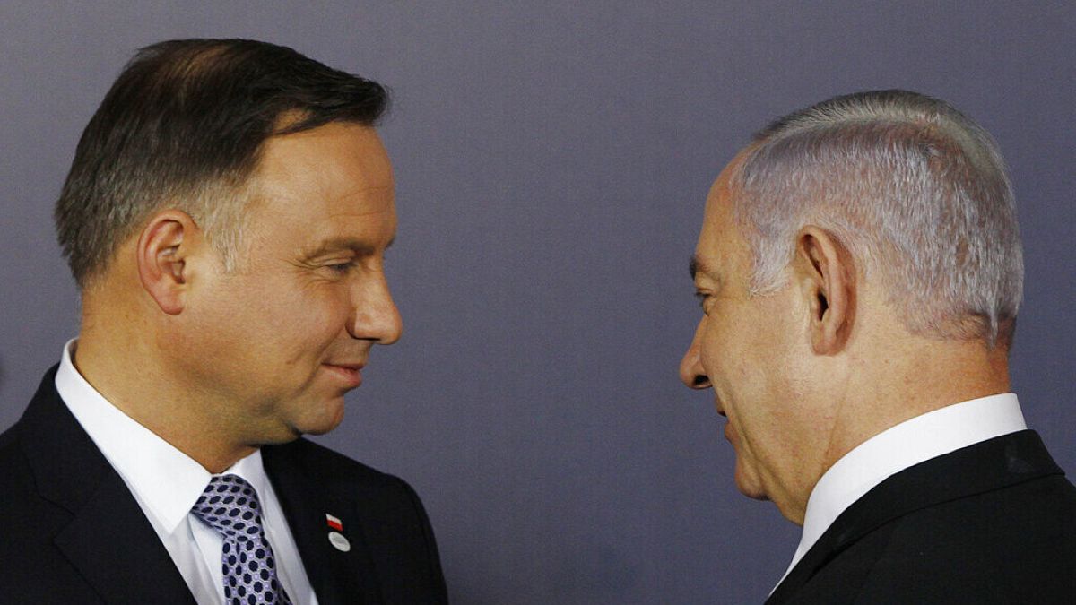 Poland’s Duda says Netanyahu should be free to attend Auschwitz event