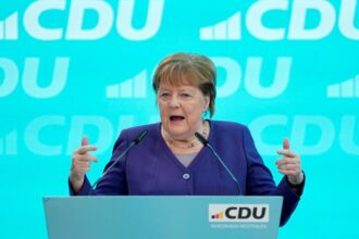 Merkel criticises Merz for teaming up with Germany’s far-right