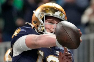 Notre Dame’s Riley Leonard points to favorite Bible verse after scoring opening TD in national title game