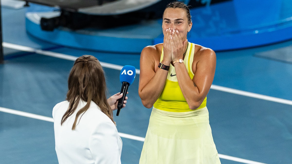 Aryna Sabalenka reacts during interview