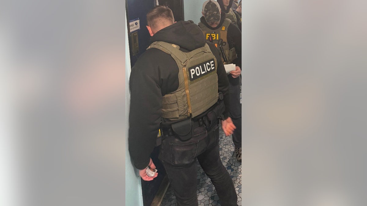 Officers from the FBI conduct immigration enforcement in New York