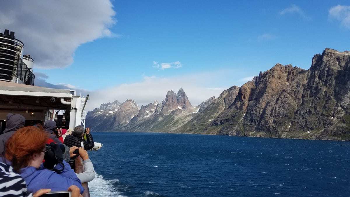 Cruise ship passengers take photos of fjords in Greenland (Danuta Hamlin) 