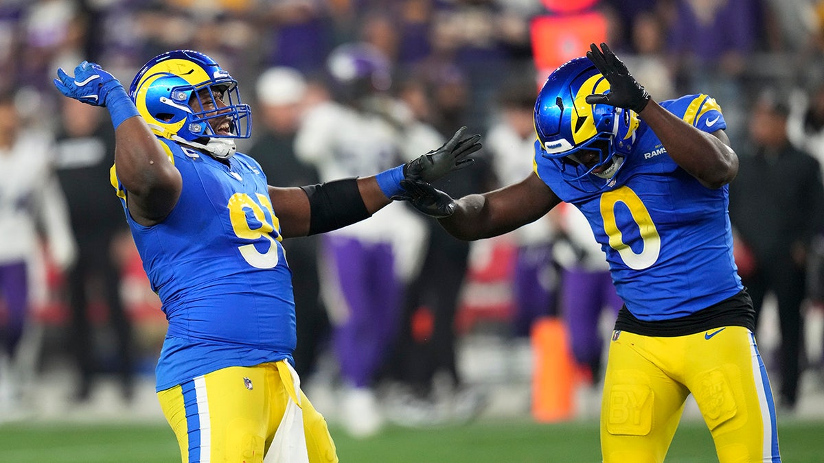 Kobie Turner and Byron Young celebrate