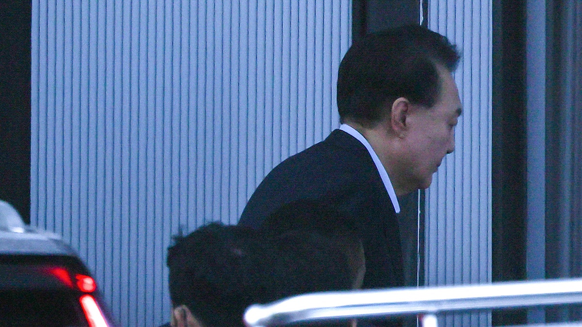 South Korean impeached President Yoon Suk Yeol arrives at the complex building housing the Corruption Investigation Office for High-ranking Officials in Gwacheon on Jan. 15, 2025. Yoon was arrested on Jan. 15 over his failed martial law bid, after hundreds of anti-graft investigators and police raided his residence to end a weekslong standoff.