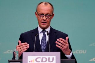 Former EU chief calls Friedrich Merz ‘resolute and determined’