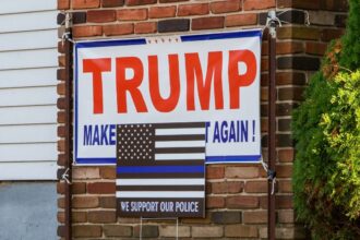 Trump flag in Massachusetts police station gym divides town as chief, official feud over its removal: report