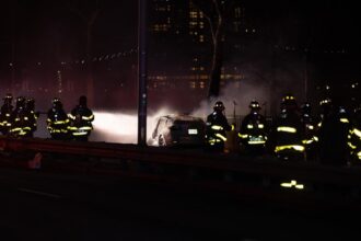 Female driver killed, passenger injured as Tesla flips and bursts into flames on NYC’s FDR Drive