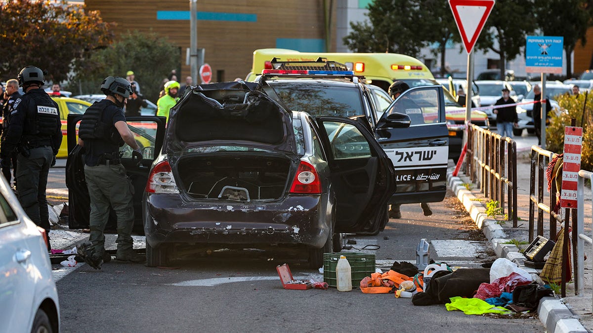 Car used in suspected ramming attack in Israel seen in cordoned off area