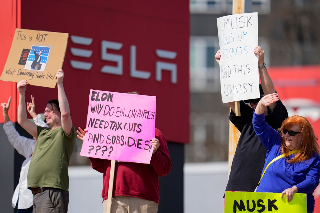 Tesla vehicles, charging stations targeted as protesters denounce DOGE, Elon Musk