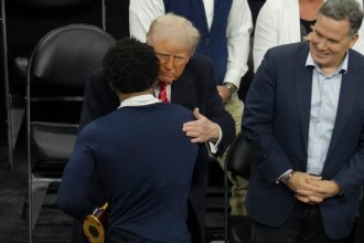 NCAA wrestling champions shake hands with Trump after winning title bouts