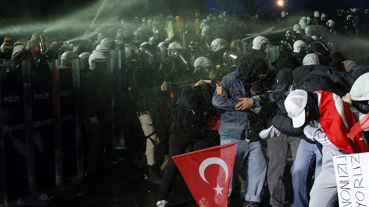 People take part in a protest on the day Istanbul Mayor Ekrem Imamoglu was jailed as part of a corruption investigation, in Istanbul