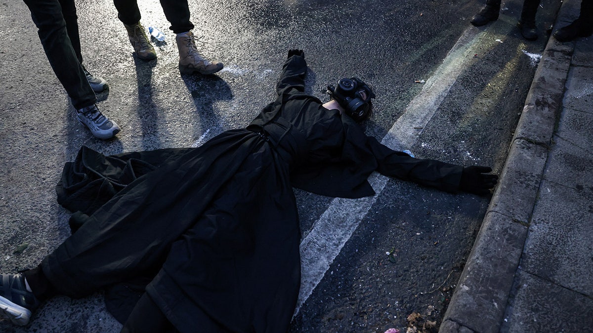 People take part in a protest on the day Istanbul Mayor Ekrem Imamoglu was jailed as part of a corruption investigation, in Istanbul