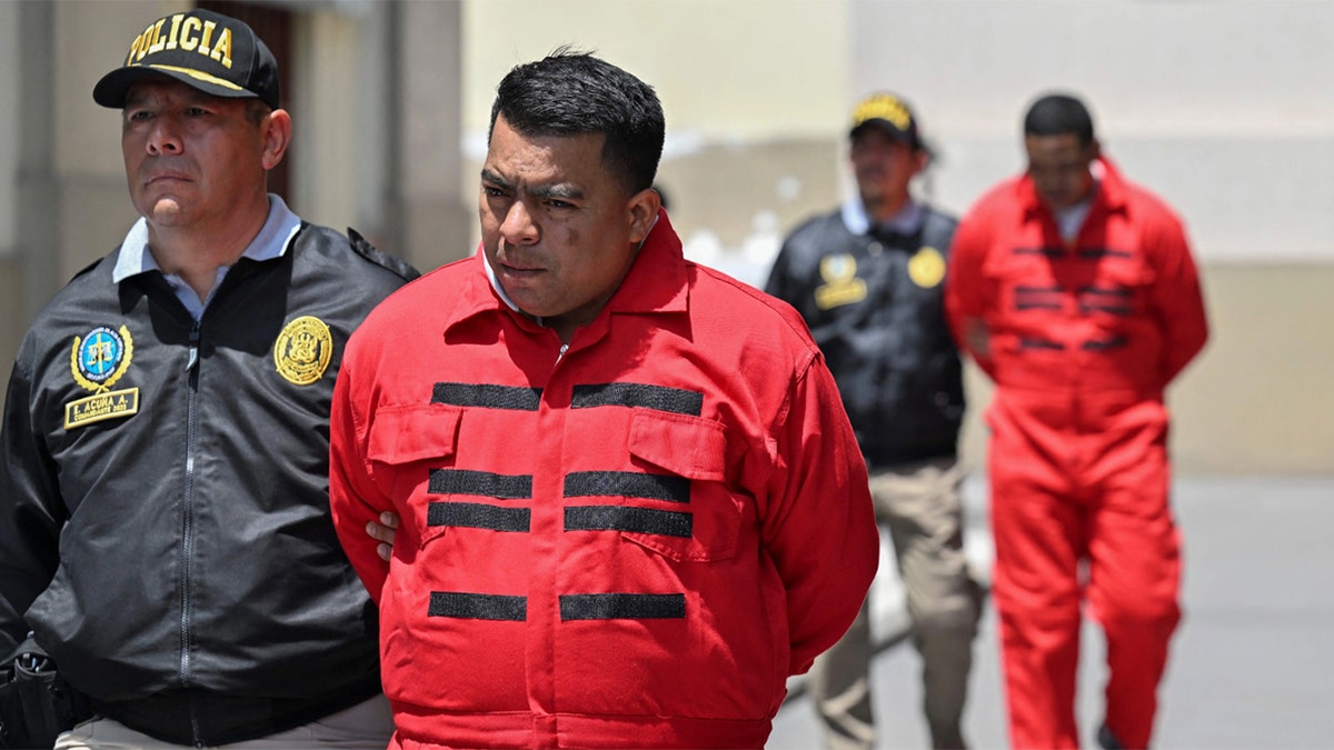 Peruvian police carry out the transfer of several members of the Tren de Aragua criminal organization in Lima on October 5, 2023. Peruvian police on Thursday captured the alleged leader and 31 other members of a faction of the Tren de Aragua, the Venezuelan-born criminal organization that sows terror in several South American countries with murders and extortion, according to authorities. The offensive against what is considered the most dangerous gang operating in Peru was carried out in several regions of the country.