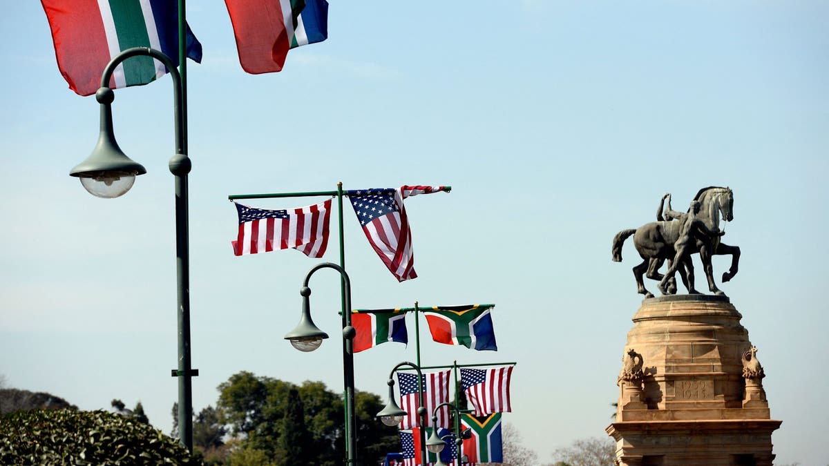 U.S. and South African flags are shown