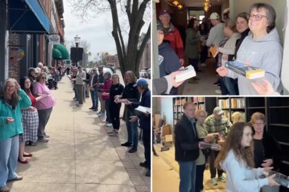 300 residents in small Michigan town help bookstore move 9K titles  to new shop space with ‘book brigade’: video