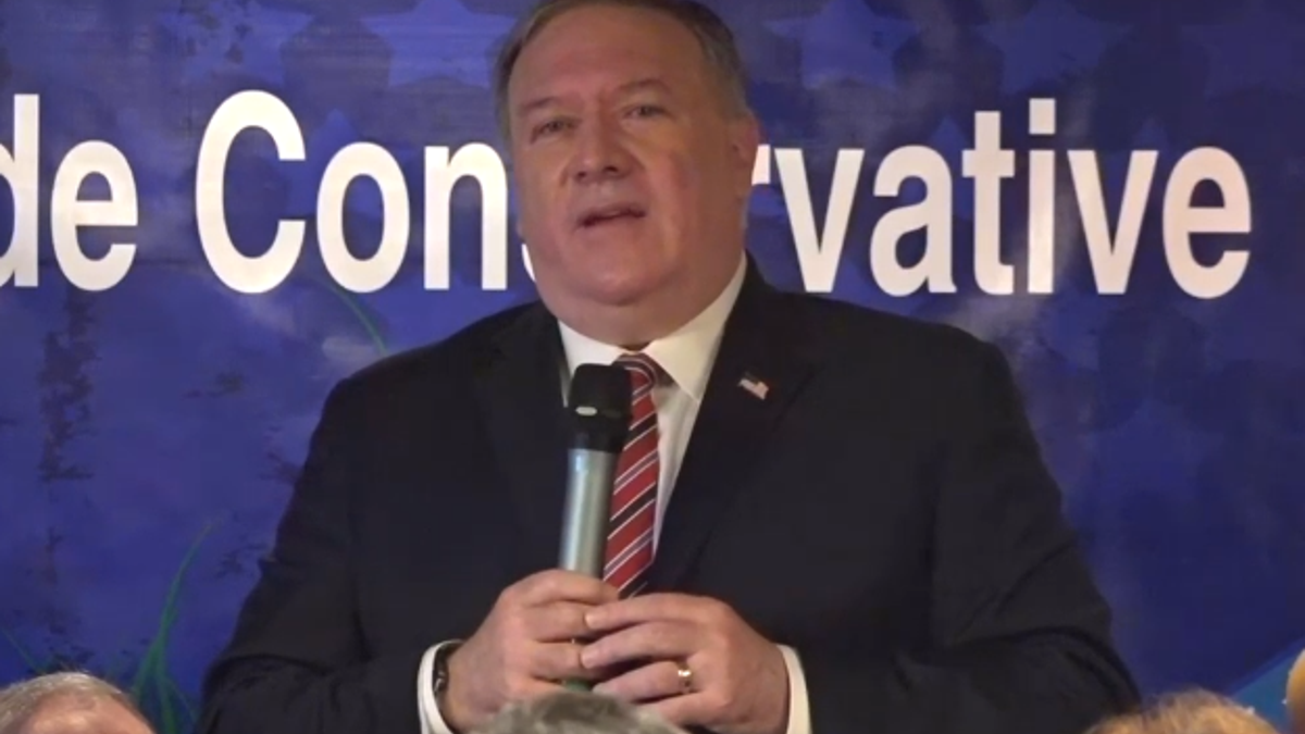 Former Secretary of State Mike Pompeo with microphone