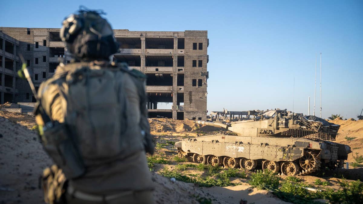 IDF troops encircle Tel al-Sultan in Rafah, Gaza as they dismantled terror infrastructure sites and terrorists in the area. The IDF said the operation was in order to reinforce control and expand the security zone in southern Gaza.