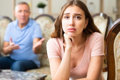 Dear Abby: My dad and his boss keep setting me up with losers