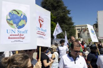 Almost 500 staff protest against UN budget cuts in Geneva rally