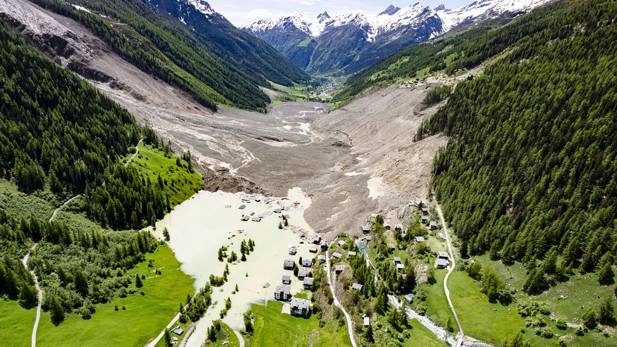 Search suspended for missing man after landslide buries Swiss village