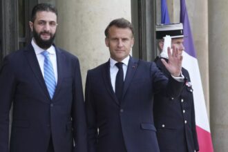 Macron supports easing sanctions on Syria after meeting al-Sharaa