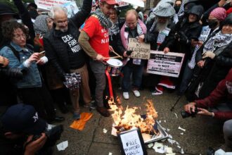 Anti-Israel protesters torch diplomas outside Columbia University on graduation day