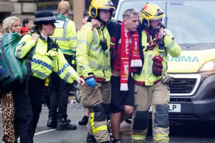 Dozens injured after driver plows through crowd of Liverpool soccer fans during victory parade
