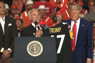 Steelers players join Trump on stage at Pennsylvania event and give him custom jersey