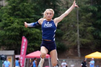 California track and field championship sees arrest and aerial banner amid transgender controversy