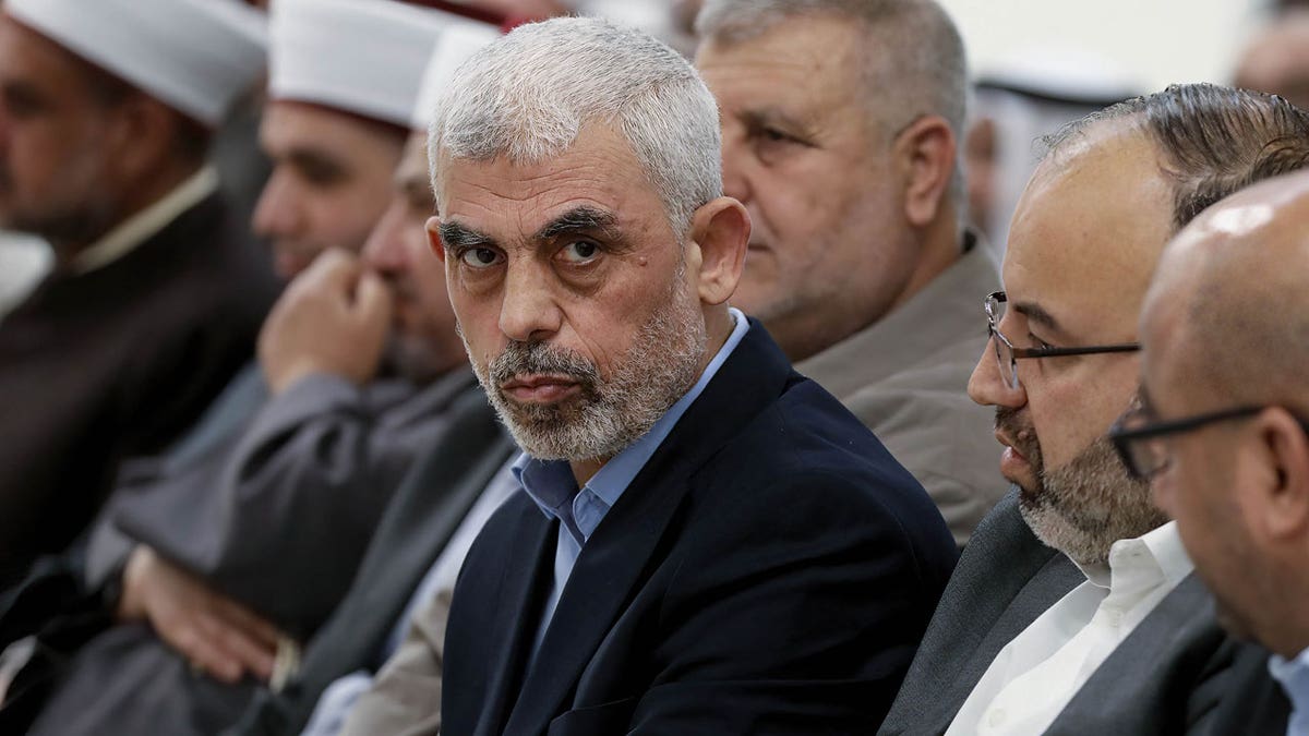Yahya Sinwar wearing a dark colored blazer