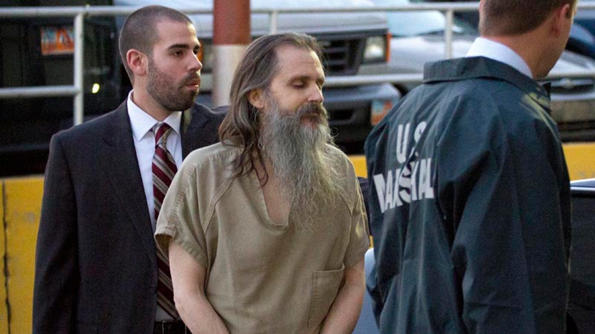 Nov. 4: Brian David Mitchell, the man accused of kidnapping Elizabeth Smart, is escorted into the Frank E. Moss Federal Courthouse in Salt Lake City. Nov. 8 Mitchell’s lawyer argued Mitchell was influenced by mental illness.