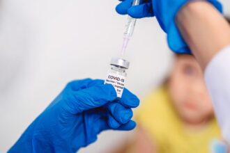 The CDC Opposes RFK Jr.’s COVID Vaccine Guidance, Saying Children ‘May Receive’ Their Shots