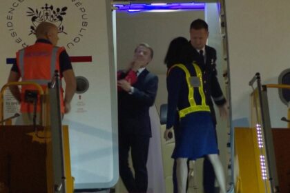 Emmanuel Macron’s wife seen shoving him in the face in viral clip as France’s first couple arrives in Vietnam