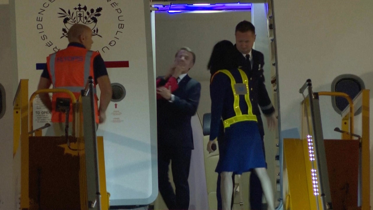 Emmanuel Macron’s wife seen shoving him in the face in viral clip as France’s first couple arrives in Vietnam