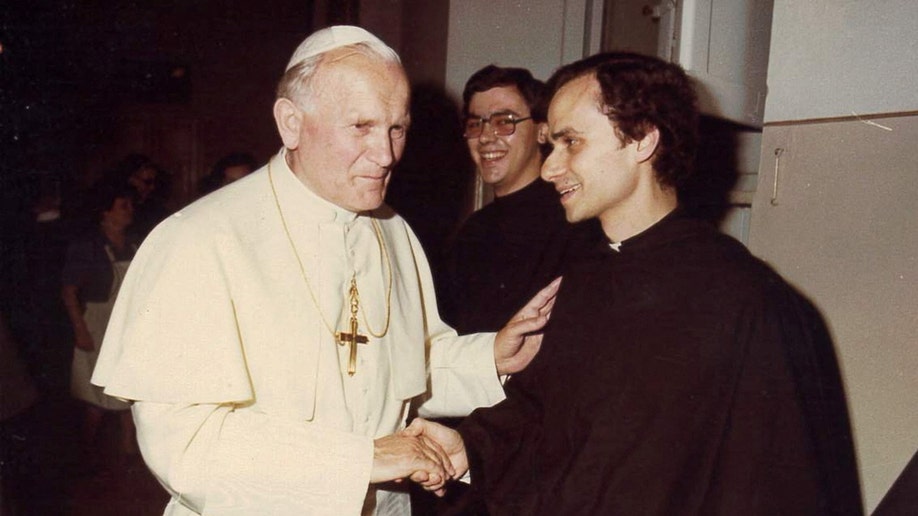 Pope John Paul II meets the future Pope Leo XIV