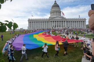 Blue cities adopt Pride flags as official symbols in bid to skirt red-state laws
